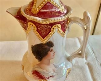 $45 - Transferware coffee pot with portrait and luster finish; 8.5" H x 5.5" W; as is, small chip in the lid  