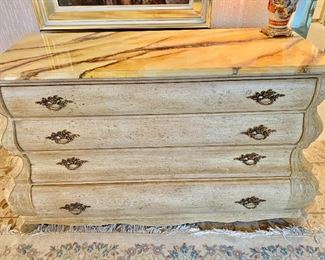 $695; Large bombe chest/dresser, faux marble finish top, four drawers; 36" H x 60" W x 23" D 