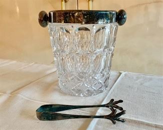 $75 - Large glass ice bucket with silverplate rim and handles, with tongs; 9” H x 8” W