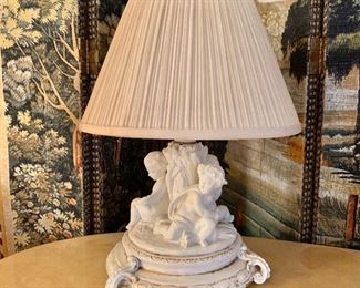 $150 - Vintage blanc de chine lamp with cherub motif, tested and working; 15.5" total height with a 11.5" shade 