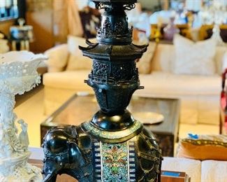 $1995; Cast metal and enamel incense burner/lamp; two parts on base; top section has been electrified; 32" H x 9" W x 15" D