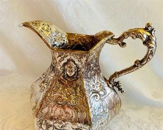 $90; EG Webster& sons repousse silverplate pitcher;  approx 9" high
