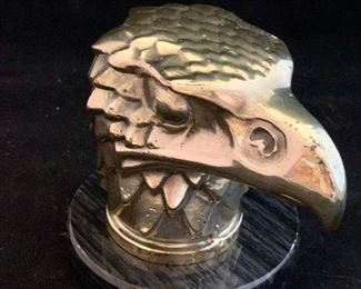 $65; Brass hood ornament in the manner of Lalique "Tete D'aigle" ;  4" high on 5" diameter base.  