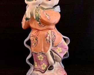 $180 PAIR of Porcelain figurines; #1 of 2 shown; approx 13" high; as is (small chip in fruit leaf)