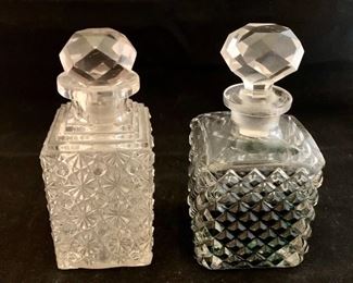 Vintage glass decanters; $40; Daisy button bottle with chipped stopper (Left); $40 Geometic bottle with green liquid; stopper stuck; each approx 7" high