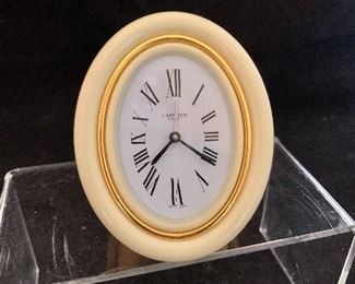 $150 - Vintage oval Cartier alarm clock; 3.5" H