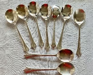 $50 - 9 Silver plate soup spoons