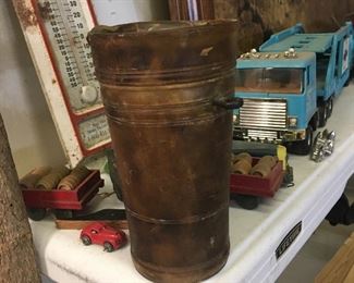 this is a set of carved horn cups... it's the craziest thing here...it is like a 150 year old tumbler from starbucks with it's own extra cup inside. Seriously.. strangest thing here, looks like it hung off a wagon the crossed the the country and settled "out west"