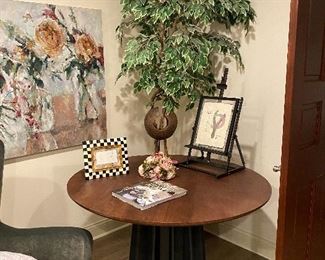 Crate and Barrel Shoreditch dining table created by Designer Leonhard Pfeifer Round dining table pleats a modern pedastal with a masculine edge 47" Diameter 29" t, not all decor on table or painting available