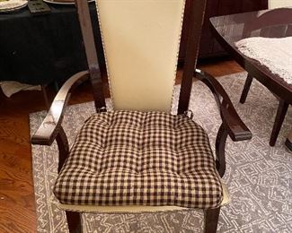 Milano Dining room table, with Sapelli Mahogany Finish  42.5 x 72.5 includes 2 17" extensions, 2 Milano Arm chairs with Sapelli Mahogany Finish and Beige Leather seat and back, and 4 Side chairs