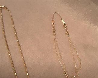 Two 14kt Gold Chains, One with Gold Ball Pendant.