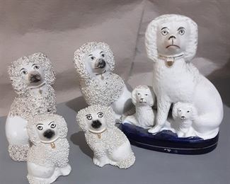 Grouping of Antique White Staffordshire Miniature Dogs.