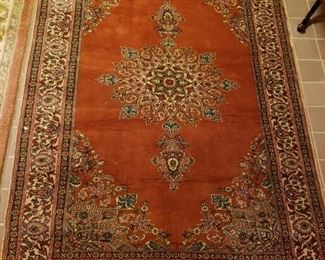 ONE OF MANY ORIENTAL RUGS
