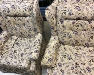 Pair of upholstered chairs with one ottoman 