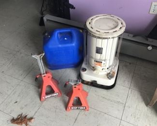 Kerosene heater with container and a pair of Shop Force Jack Stands