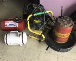 Karcher pressure washer, portable air tanks, oil change catch container and a vintage 5 gal gas can.
