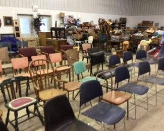 Chairs Chairs and more chairs. They are placed for the auction audience but will be auctioned Saturday.