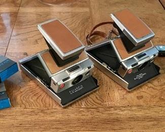 Vintage Polaroid Sx-70 Land cameras, great condition. Cash out in living room