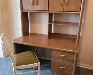 https://ctbids.com/#!/description/share/697642 Desk is 63" tall, 47" x 24" wide. Top drawer is 12" x 14" wide and 3" deep. The bottom drawer is also " 12" x 14" wide but its 9 " deep. The open shelf is 11" x 23" wide. The closed cabinet is 40" x 9" wide. The wooden chair is 34" tall at the back and 18" to the seat. The chair seat is 16" x 17" wide.