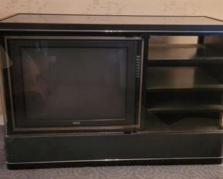 https://ctbids.com/#!/description/share/697664 Check out this awesome blast from the past! State of the art...in the 1980's. RCA Dimensia console television. The entire bottom is a speaker. There are 3 display shelves behind a glass door. TV appears to be around 25” The pieces is 31" tall, 49" across and 19" to the wall. https://en.wikipedia.org/wiki/RCA_Dimensia

