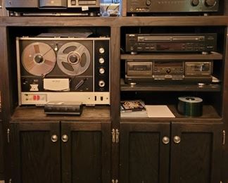 https://ctbids.com/#!/description/share/697663 This is an amazing set!

Technics HX Pro
TDK Digital Audio CD Recorder
Sony Sterecorder 
Sony Megastorage 300 CD Changer
Radio Shack Speaker Control
Sony Digital A/V Control Center
Includes tape reels and so much more. Its a complete cabinet with extra blank cds and tape reels! This is a great addition to your sound system! Have it all in one place!! The cabinet total height is 46". Its 44" wide and 19" to the wall.