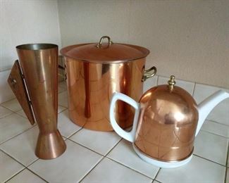 https://ctbids.com/#!/description/share/697668 Retro pint glass is 9" tall. The stockpot is 7 1/2" inches tall with a 9" diameter. Teapot is ceramic with a brass overlay.

