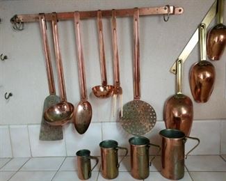 https://ctbids.com/#!/description/share/697667 Beautiful assortment of copper kitchen utensils. Includes measuring cups, measuring scoops, ladle, slotted spoon and spatula.

