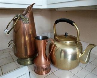 https://ctbids.com/#!/description/share/697670 Large copper wine bottle holder is 19" tall at spout. Brass kettle is approximately 11" at lid.

