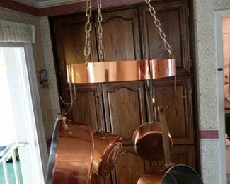 https://ctbids.com/#!/description/share/697674 Copper pots range in size from 2 qt to 5 qt. Includes copper pot rack that hangs from ceiling.

