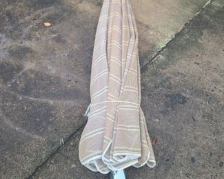https://ctbids.com/#!/description/share/697681 Nice outdoor patio umbrella. Measures 94" circumference and 63" tall. Umbrella is sun faded but no holes. Crank does work to open and close it.

