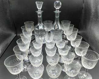 https://ctbids.com/#!/description/share/697686 Set of 2 crystal decanters are 12" high, glasses range from approximately 3 1/2" high to 6" high.

