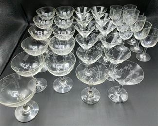 https://ctbids.com/#!/description/share/697689 Nice collection of matching glassware for your bar. Includes wine, martini and champagne glasses.
Glasses are 4" to 4 1/2" tall with Bamboo etchings.