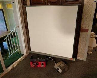 https://ctbids.com/#!/description/share/697690 Ambico All in One video transfer system. Convert old family movies, pictures and slides and put them on tape. Full projector screen measures 4 foot square and sits on it's own tripod. Screen folds down for easy storage. Airequipt 135 projector still works! Check out the video!