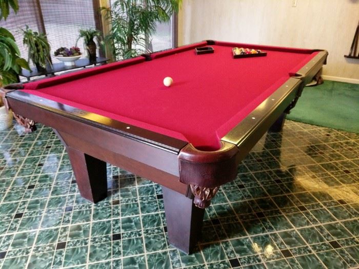 https://ctbids.com/#!/description/share/697698 This is a fabulous find! Handcrafted in Tennessee. Arguably the best maker of luxury billiard tables in the country. This beautiful Olhausen billiard table with leather basket pockets, red felt top, balls, 2 racks, and a cover. Table measures 8’ x 4.5.’ The table is located on a side porch which will make it easier to remove from the home.