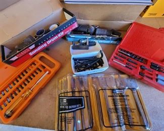 https://ctbids.com/#!/description/share/697711 Everything from allen wrenches to sanding attachments. Craftsman bit kit and Craftsman wood boring bits.

