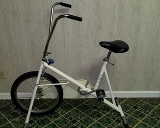 https://ctbids.com/#!/description/share/697713 Stationary exercise bike, 44" L x 44" adjustable leather seat 10" x 10".

