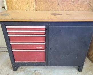 https://ctbids.com/#!/description/share/697742 Nice Craftsman toolbox. Wood slab is attached to tool box. Has five drawers for tool storage top two measure 18" x 2", third and fourth shelf down measures 18" x 5", bottom drawer measures 18" x 9". Full measurements with wood top measures 54" x 20" x 34". All tools and accessories in drawers come with tool box.

