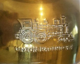 Brass spittoon with train closeup.  Brass Union Pacific Railroad RR train Spittoon.