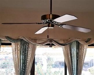 Fans throughout home for sale. Draperies for sale too.