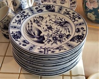 Blue and white plates. There are a lot of pieces.