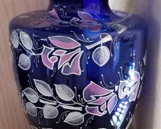 Large blue glass vase.