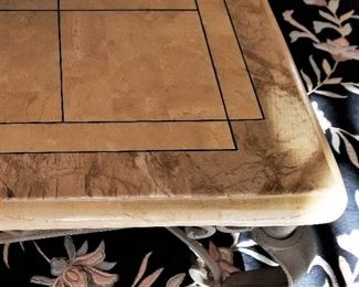 Top view of square stone coffee table.