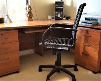 Wonderful modern curved desk with separate roll out file cabinets. Modern office chair for sale too.