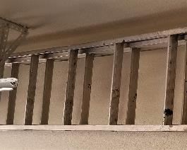 Extension ladder and other ladders for sale.