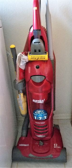 Upright Eureka vacuum.