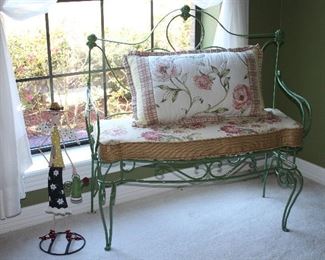 Vintage Wrought Iron Metal in Celedon Green Paint Sunroom/Patio Bench (39”W x 39”H T Back and 18”D Seat w/Custom Upholstered Seat Cushion shown with a Croscill Retangular Floral Throw Pillow and a Metal Hand Painted Sculpture Gardener w/watering Pail Figurine (25”H)