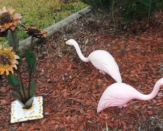 Tin Sun Flower Garden Sculpture shown Pink Garden Flamingos