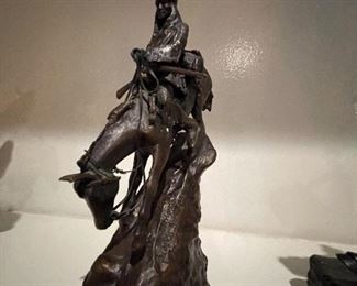 Remington Statues - reproductions in the smaller sizes. Some limited edition pieces.