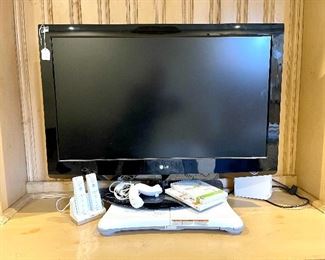 TV with like new Wii System. 2 controllers, games etc.