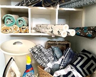 Designer wallpaper (new in package) and fabrics, tons of pillow shams, baskets and other linens!